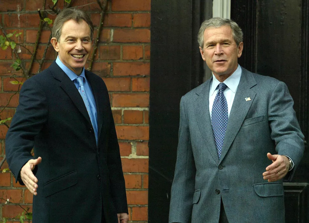 Kompanjona v zločinu: britanski premier Tony Blair je bil eden redkih, ki je podprl križarsko vojno Georga W. Busha. 