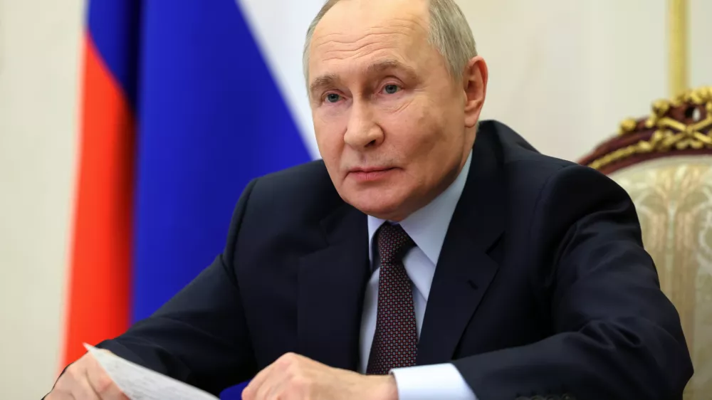 FILE - Russian President Vladimir Putin holds a videoconference cabinet meeting at the Kremlin in Moscow, Thursday, April 23, 2026. (Alexander Kazakov/Sputnik, Kremlin Pool Photo via AP, File)
