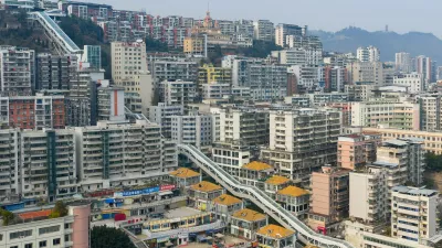 Wushan,China.14th January 2026. The aerial photos captured the soon-to-be-operational Goddess Escalator (Shennü Da Futi) located in Wushan County, southwest China's Chongqing Municipality, January 14, 2026. The Goddess Escalator project is built along the existing north-south urban central axis of Shennü Avenue. It is a multi-level electric escalator system designed as a key vertical transit corridor for the city, with a total longitudinal length of approximately 905 meters, surpassing the Chongqing Crown Escalator. The total vertical lift height is over 240 meters, equivalent to the height of an 80-story building. The project includes 21 escalators, 8 elevators (including barrier-free bridge elevators), 4 moving walkways, 2 pedestrian footbridges, and 2 crossover passages. Once operational, travel time along the upper and lower sections of Shennü Avenue will be reduced from nearly one hour to about 20 minutes, significantly facilitating daily commuting for residents and sightseeing for tourists. Credit: He Penglei/China News Service/Alamy Live News,Image: 1066197235, License: Rights-managed, Restrictions: Usage restrictions: Advertising and promotion,Commercial electronic,Consumer goods,Direct mail and brochures,Indoor display,Internal business usage,Personal use, Model Release: no