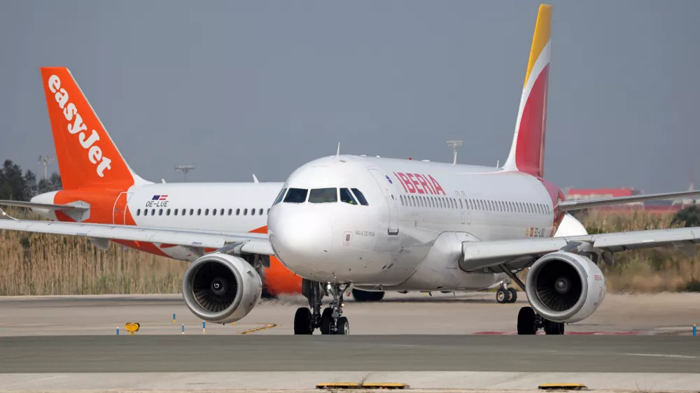 An Iberia Airbus A320-216 and an easyJet Airbus A320-251N on the runway for takeoff from Barcelona-El Prat Airport, in Barcelona, Spain, on March 13, 2026. (Photo by Joan Valls/Urbanandsport/NurPhoto)NO USE FRANCE