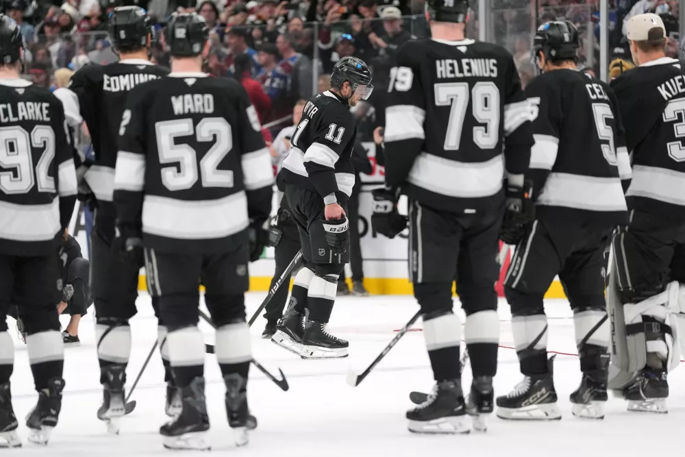 After the final game of his career, Los Angeles Kings' Anze Kopitar (11) skates off the ice following Game 4 in the first round of an NHL hockey Stanley Cup playoff series against the Colorado Avalanche, Sunday, April 26, 2026, in Los Angeles. (AP Photo/Scott Strazzante)