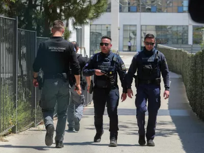 Police officers walk outside the Athens' Court of Appeal following a shooting incident that left several wounded, in Athens, Greece, April 28, 2026. Sotiris Dimitropoulos/Eurokinissi via REUTERS THIS IMAGE HAS BEEN PROVIDED BY A THIRD PARTY. NO RESALES. NO ARCHIVES. MANDATORY CREDIT. GREECE OUT. NO COMMERCIAL OR EDITORIAL SALES IN GREECE.