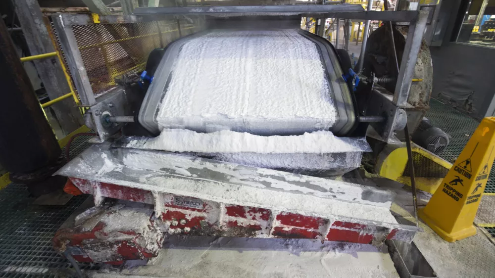 FILE - Technical grade lithium carbonate comes off a conveyor belt during a tour of the Silver Peak lithium mine on Jan. 30, 2017, near Tonopah, Nev. In an announcement Monday, Feb. 27, 2023, the U.S. Department of Energy will provide $375 million in loans to a battery recycling company to build its first, and one of the first, lithium ion battery recycling plants in North America. The DOE announcement came within hours of another announcement by American Battery Technology Company that it has discovered one of the largest known lithium deposits in the U.S. at Tonopah Flats. (Steve Marcus/Las Vegas Sun via AP)