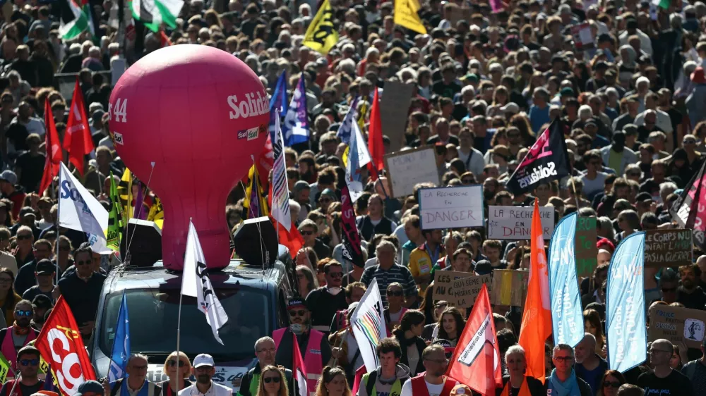 A balloon of Solidaires labour union is seen as protesters attend a demonstration in Nantes as part of a day of nationwide strikes and protests against the government and cuts in the next budget, with supporters of the "Bloquons Tout" (Let's Block Everything) movement, France, September 18, 2025. REUTERS/Stephane Mahe
