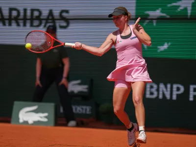 Veronika Erjavec of Slovenia returns to Elena Rybakina of Kazakhstan during their first round women's singles tennis match at the French Open tennis tournament in Paris, Monday, May 25, 2026. (AP Photo/Thibault Camus)