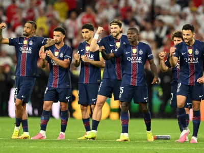 Soccer Football - UEFA Champions League - Final - Paris St Germain v Arsenal - Puskas Arena, Budapest, Hungary - May 30, 2026 Paris St Germain players react during the penalty shootout REUTERS/Angelika Warmuth