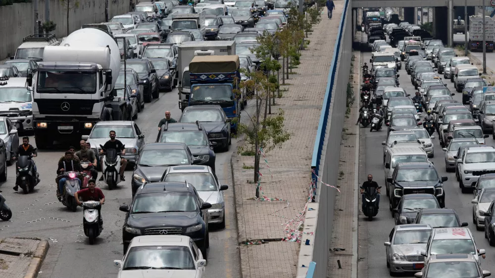 Cars sit in traffic on a highway as residents flee following an Israeli threat to strike Dahiyeh, Beirut's southern suburbs, Lebanon, Monday, June 1, 2026. (AP Photo/Bilal Hussein)