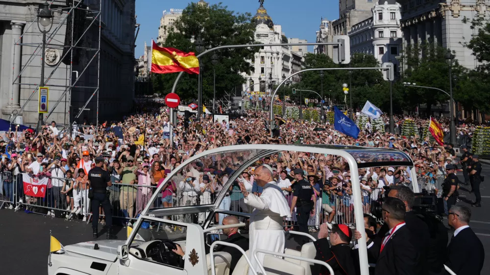 Pope Leo XIV arrives to preside over Mass marking the Catholic feast of Corpus Christi in Plaza de Cibeles in Madrid, Sunday, June 7, 2026, on the second day of a seven-day apostolic journey to mainland Spain and the Canary Islands. (AP Photo/Alessandra Tarantino)