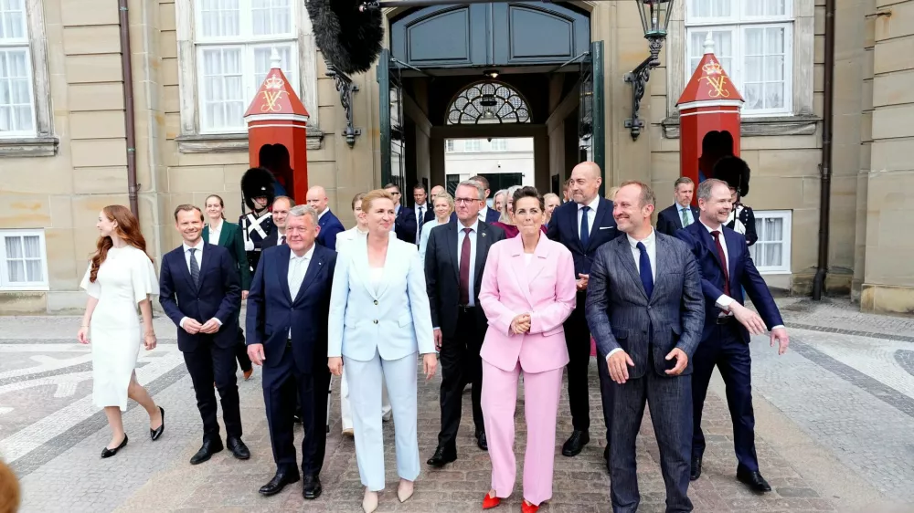 Lars Loekke Rasmussen, Mette Frederiksen, Pia Olsen Dyhr and Martin Lidegaard after presenting a new government to the king at Amalienborg Castle in Copenhagen, Wednesday, June 3, 2026. Ritzau Scanpix/Sebastian Elias Uth via REUTERS  ATTENTION EDITORS - THIS IMAGE WAS PROVIDED BY A THIRD PARTY. DENMARK OUT. NO COMMERCIAL OR EDITORIAL SALES IN DENMARK.