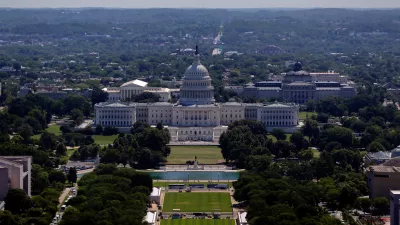 The U.S. Capitol and National Mall are seen as the set up for the America 250 celebration continues, Wednesday, June 3 2026, in Washington. (AP Photo/Rahmat Gul)