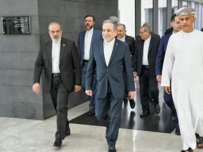 FILE - In this photo released by the Iranian Foreign Ministry, Iranian Foreign Minister Abbas Araghchi, center, heads to the venue for talks between Iran and the U.S., in Muscat, Oman, Friday, Feb. 6, 2026. (Iranian Foreign Ministry via AP, File)