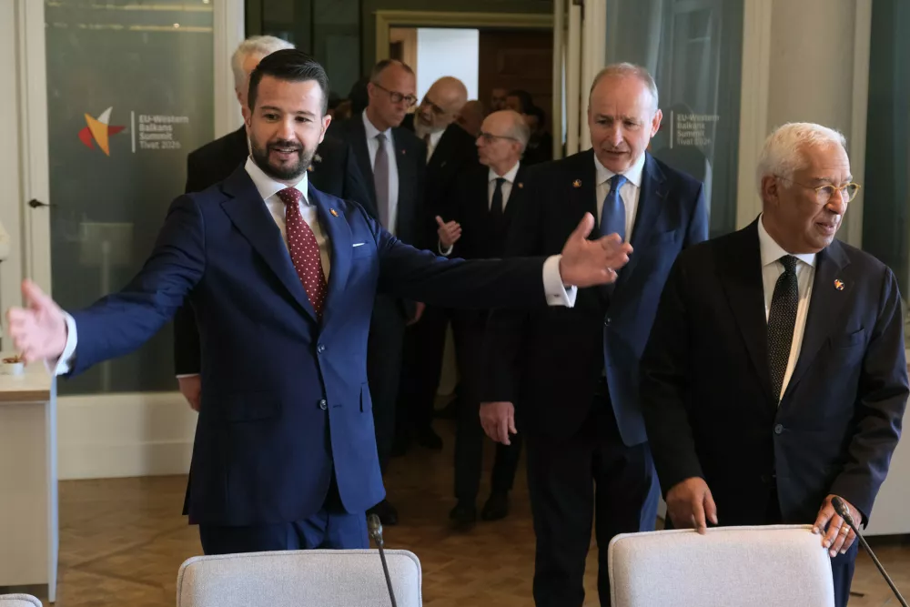 Montenegro's President Jakov Milatovic, left, and European Council President Antonio Costa, right, attend the EU-Western Balkans summit in the Montenegrin coastal town of Tivat, Friday, June 5, 2026. (AP Photo/Risto Bozovic)