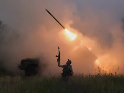 In this photo provided by Ukraine's 93rd Kholodnyi Yar Separate Mechanized Brigade press service, a soldier reacts as an MRLS BM-21 "Grad" fires at the Russian positions near Kostiantynivka, Donetsk region, Ukraine, Thursday, June 4, 2026. (Iryna Rybakova/Ukraine's 93rd Mechanized Brigade via AP)