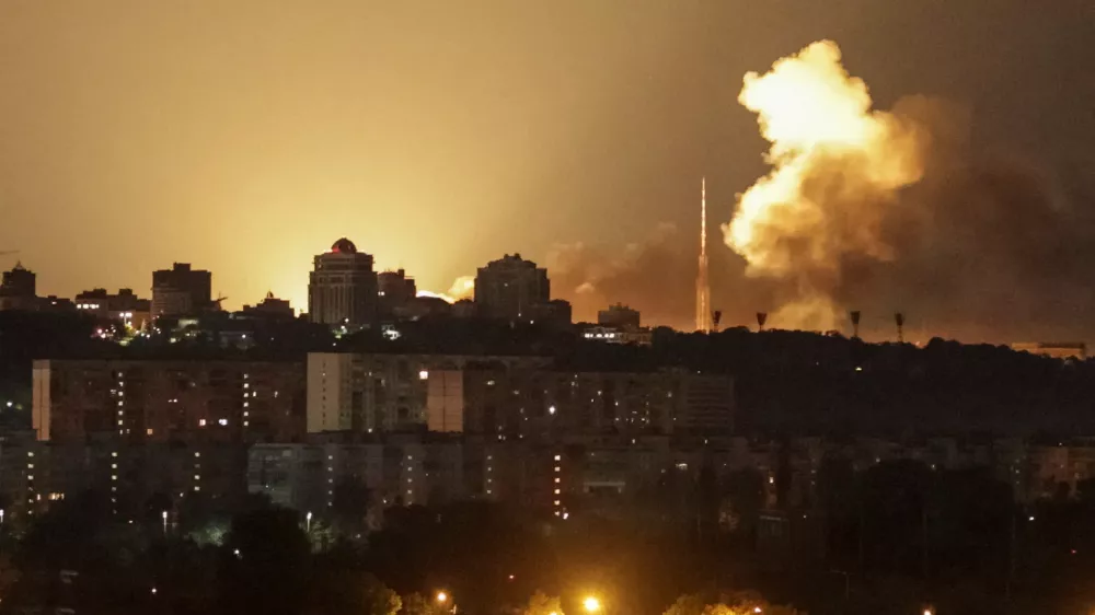 An explosion lights up the sky over the city during a Russian missile and drone strike, amid Russia's attack on Ukraine, in Kyiv, Ukraine June 2, 2026. REUTERS/Vladyslav Sodel