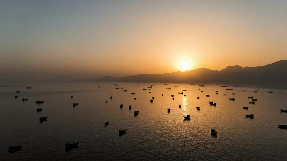 FILE PHOTO: A drone view of vessles anchored in the Strait of Hormuz as seen from Musandam, Oman, June 3, 2026. REUTERS/Stringer/File Photo