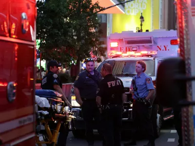 New York Police officers and firefighters gather after reports of a stabbing incident at Penn Station in New York City, U.S. June 7, 2026. REUTERS/Jeenah Moon
