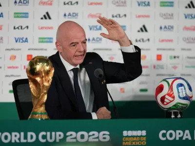FIFA President Gianni Infantino speaks during a news conference at the stadium in Mexico City, Wednesday, June 10, 2026, a day before the opening FIFA World Cup match between Mexico and South Africa. (AP Photo/Eduardo Verdugo)