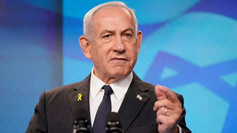 FILE PHOTO: Israeli Prime Minister Benjamin Netanyahu gestures during a joint press conference with U.S. Secretary of State Marco Rubio (not pictured) at the Prime Minister's Office, during Rubio's visit, in Jerusalem, September 15, 2025. REUTERS/Nathan Howard/Pool/File Photo