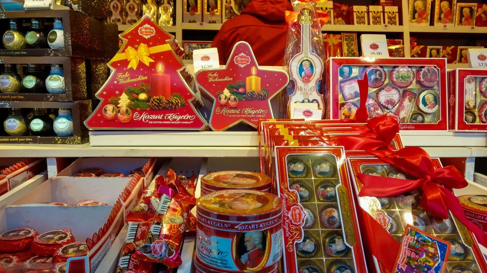 SALZBURG, AUSTRIA - DECEMBER 9, 2018: Traditional Austrian chocolates called Mozartkugeln (chocolate balls) at the famous christmas market of Salzburg