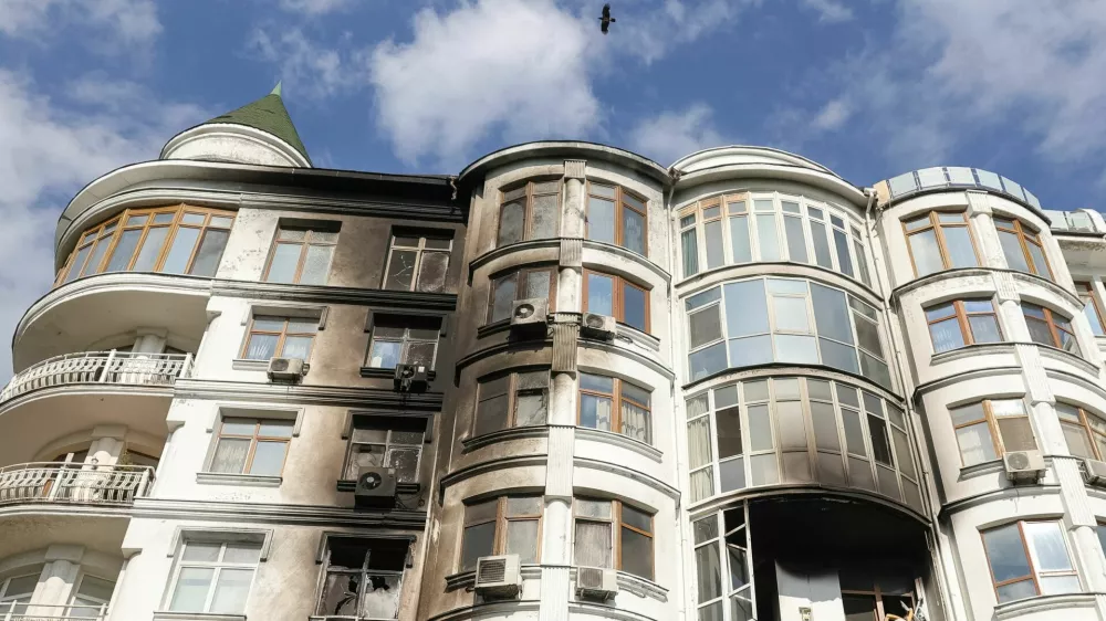 A crow flies over an apartment building damaged by a Russian drone strike, amid Russia's attack on Ukraine, in Odesa, Ukraine June 10, 2026. REUTERS/Nina Liashonok