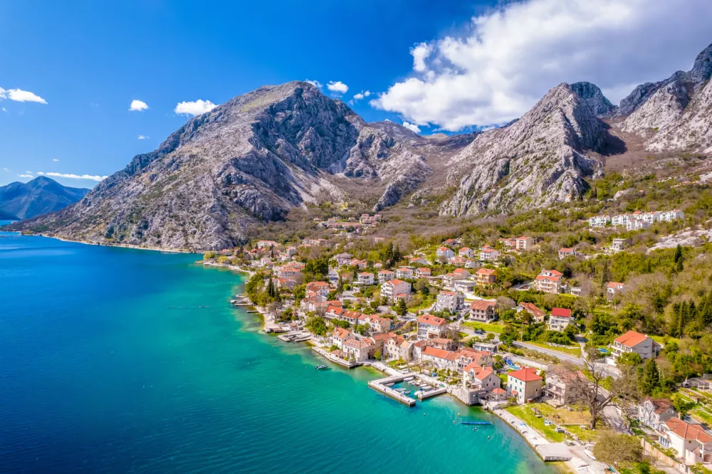 Scenic Boka Kotorska bay village of Donji Orahovac aerial view, archipelago of Montenegro