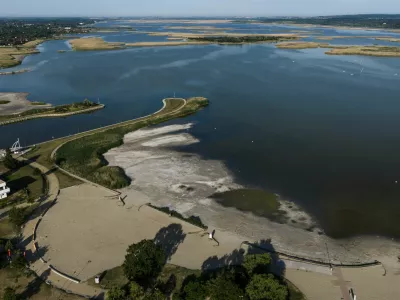 A drone view of the drying Lake Velence, Hungary's third-largest lake, where years of drought and insufficient water retention have led to critically low water levels in Velence, Hungary, June 9, 2026. REUTERS/Marton Monus
