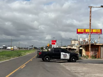 Law enforcement responds to an active shooting scene Friday, June 12, 2026, in Midland, Texas. (Luke Dias/Reporter-Telegram via AP)