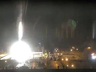 Surveillance camera footage shows a flare landing at the Zaporizhzhia nuclear power plant during shelling in Enerhodar, Zaporizhia Oblast, Ukraine March 4, 2022, in this screengrab from a video obtained from social media. Zaporizhzhya NPP via YouTube/via REUTERS THIS IMAGE HAS BEEN SUPPLIED BY A THIRD PARTY. MANDATORY CREDIT. NO RESALES. NO ARCHIVES. REFILE - ADDITIONAL CAPTION INFORMATION