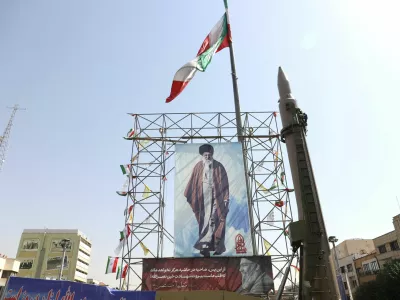 FILE PHOTO: An Iranian missile system is displayed next to a banner with a picture of Iran's Supreme Leader Ayatollah Ali Khamenei and the late Lebanon's Hezbollah leader Hassan&nbsp;Nasrallah, in a street in Tehran, Iran, October 2, 2024. Majid Asgaripour/WANA (West Asia News Agency) via REUTERS ATTENTION EDITORS - THIS IMAGE HAS BEEN SUPPLIED BY A THIRD PARTY/File Photo