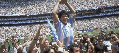 FILE - In this June 29, 1986, file photo, Diego Maradona holds up his team's trophy after Argentina's 3-2 victory over West Germany at the World Cup final soccer match at Azteca Stadium in Mexico City. The Argentine soccer great who was among the best players ever and who led his country to the 1986 World Cup title died from a heart attack on Wednesday, Nov. 25, 2020, at his home in Buenos Aires. He was 60. (AP Photo/Carlo Fumagalli, File)